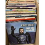 A BOX OF ASSORTED SINGLE ROCK AND POP RECORDS