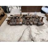 A LARGE QUANTITY OF VINTAGE WOODEN PLANES