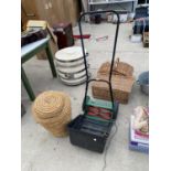 A HAND PUSH LAWN MOWER AND A RATTAN LAUNDRY BASKET