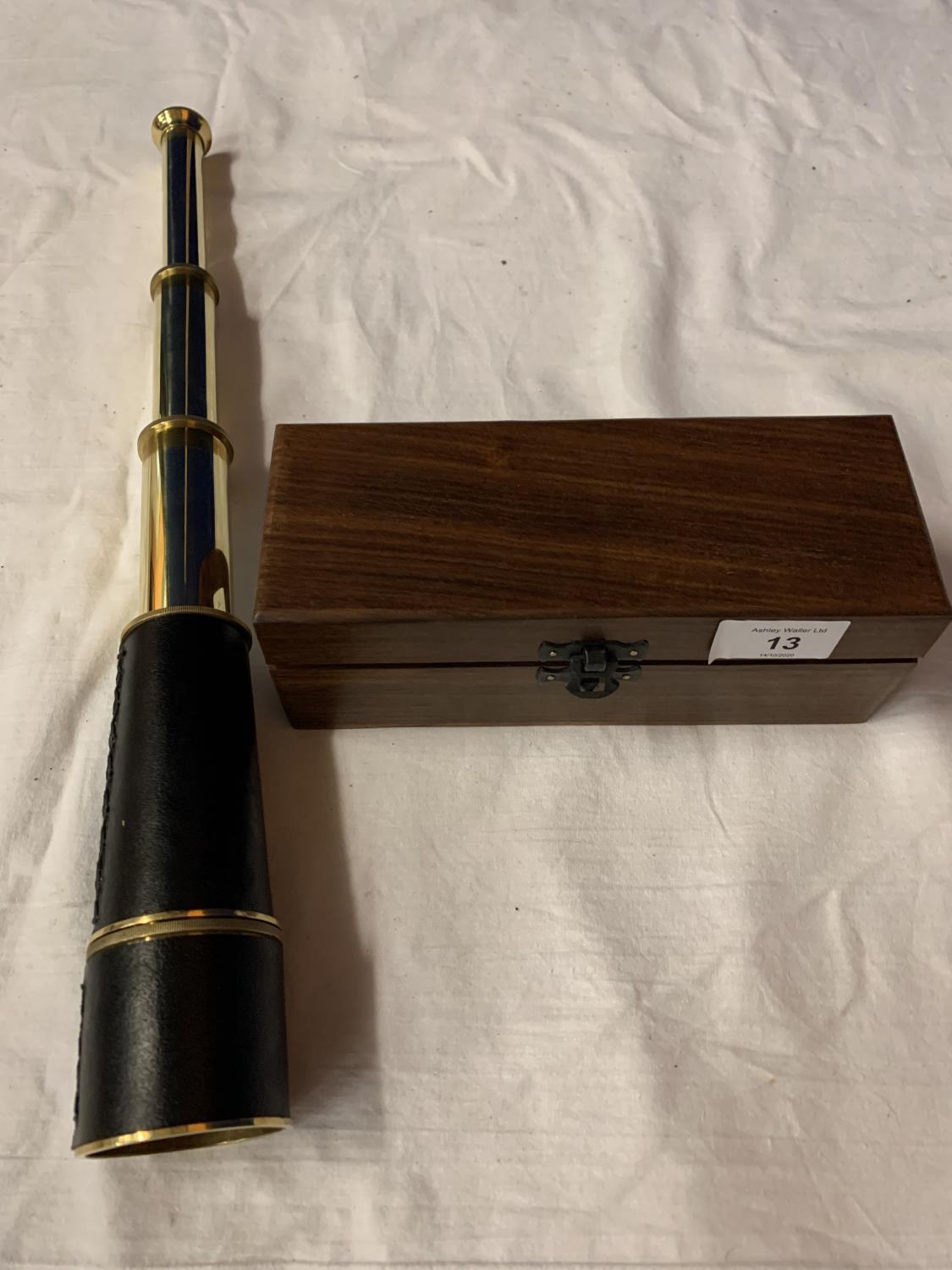 A LEATHER AND BRASSWARE TELESCOPE TO INCLUDE A WOODEN HINGED BOX FROM ROSS, LONDON