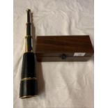 A LEATHER AND BRASSWARE TELESCOPE TO INCLUDE A WOODEN HINGED BOX FROM ROSS, LONDON