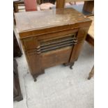 A WALNUT RADIOGRAM CABINET