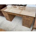 A MODERN PINE EFFECT KNEEHOLE DESK, 60x26"