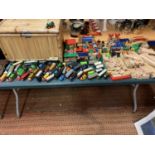 A LARGE QUANTITY OF WOODEN TOY TRAIN TRACKS AND THOMAS THE TANK ENGINES TO INCLUDE A LARGE LIDDED