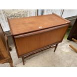 A G-PLAN STYLE TEAK FALL RECORD FRONT CABINET ON OPEN BASE