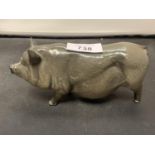 A ROYAL DOULTON POT BELLIED GREY PIG