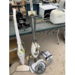 A SHARK LIFT-AWAY STEAM CLEANER WITH ACCESSORIES BELIEVED TO BE IN WORKING ORDER BUT NO WARRANTY AND