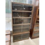 A SET OF MINTY GLASS FRONTED GRADUATED FIVE TIER BOOKCASE, 35" WIDE