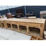 A LARGE VICTORIAN STYLE PINE DRESSER WITH FOUR DRAWERS AND OPEN BASE - 120" WIDE, 24.5" DEEP AND 37"