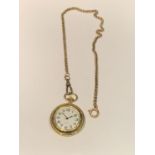 A YELLOW METAL POCKET WATCH AND CHAIN
