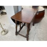 AN OAK DROP LEAF SIDE TABLE