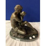 A BRONZE FIGURINE OF A MOTHER AND CHILD SIGNED RUBIN