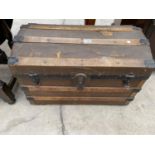 A VICTORIAN TWO HANDLED TRAVELLING TRUNK WITH DOMED TOP, 27" WIDE