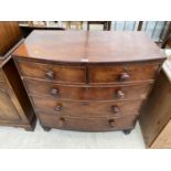A 19TH CENTURY MAHOGANY BOWFRONTED CHEST OF TWO SHORT AND THREE LONG DRAWERS, ON TURNED LEGS, 36"