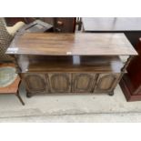 A JACOBEAN STYLE BUFFET TABLE ON BARLEYTWIST SUPPORTS, ENCLOSING CUPBOARDS TO THE BASE