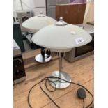 A PAIR OF RETRO OPAQUE GLASS AND CHROME TABLE LAMPS BELIEVED TO BE IN WORKING ORDER BUT NO WARRANTY