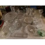 A LARGE QUANTITY OF GLASSWARE TO INCLUDE CUT GLASS BOWLS