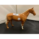 A BESWICK PALOMINO HORSE