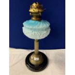 A VINTAGE OIL LAMP WITH BLUE BOWL