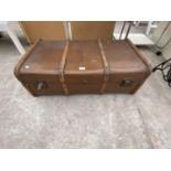 A WOOD BOUND TRAVEL TRUNK