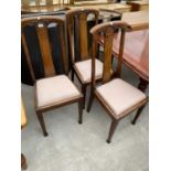 THREE EARLY 20TH CENTURY OAK DINING CHAIRS