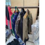 A COLLECTION OF VINTAGE CLOTHES TO INCLUDE A BRENT LEATHER JACKET, A MILTARY JACKET WITH BADGES ETC.