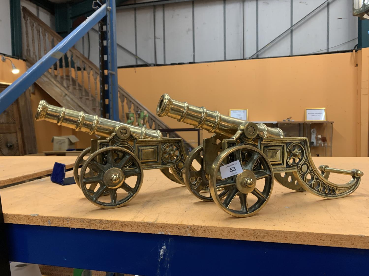 A LARGE PAIR OF BRASS CANNONS 6.5K EACH