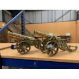 A LARGE PAIR OF BRASS CANNONS 6.5K EACH