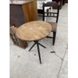 A GYPSIES TABLE ON TURNED EBONISED BASE AND A RUSH SEATED DINING CHAIR