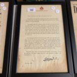A FRAMED LETTER FROM BUCKINGHAM PALACE SIGNED BY GEORGE R I