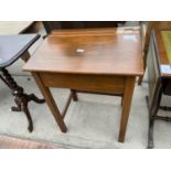 AN EARLY 20TH CENTURY BEECH CHILDS SCHOOL DESK WITH BRASS HANDLES