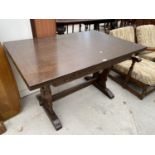 A REPRODUCTION OAK DRAW-LEAF REFECTORY STYLE DINING TABLE