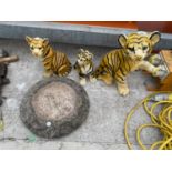 A STONE BIRD BATH TOP (AF) WITH THREE TIGER ORNAMENTS