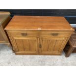 AN ASH SIDEBOARD WITH TWO DOORS AND TWO DRAWERS