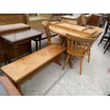 A MODERN PINE EXTENDING DINING TABLE AND FOUR VICTORIAN STYLE DINING CHAIRS AND A BENCH