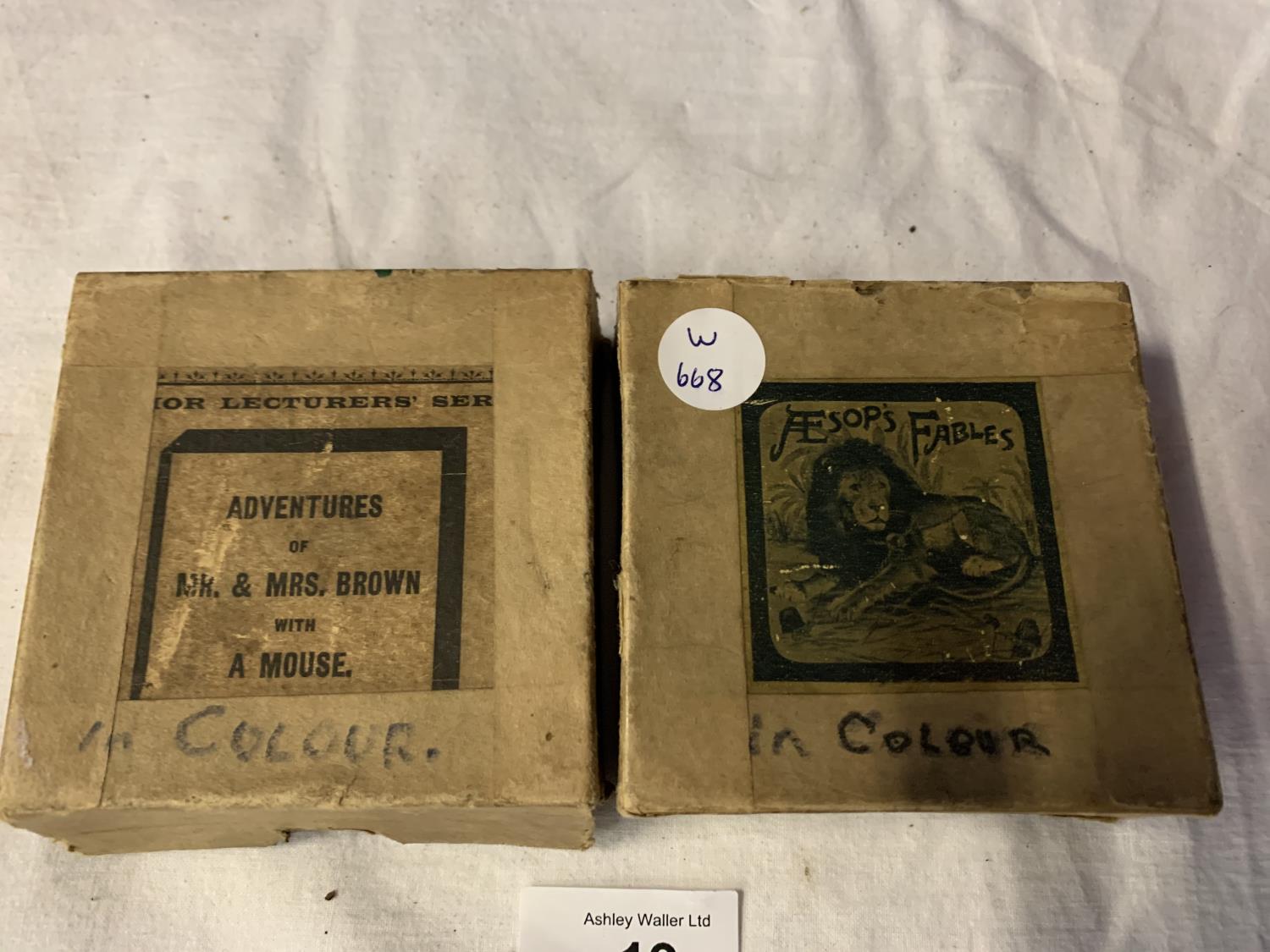 TWO OF THE JUNIOR SERIES OF LECTURERS' COLOURED MAGIC LANTERN SLIDES TO INCLUDE AESOP'S FABLES