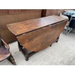 AN 18TH CENTURY AND LATER OAK GATELEG DINING TABLE