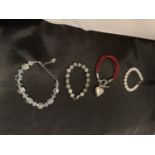 FOUR SILVER CLASP BRACELETS