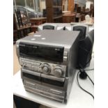 AN AIWA HI-FI SYSTEM WITH TWO SPEAKERS BELIEVED IN WORKING ORDER BUT NO WARRANTY