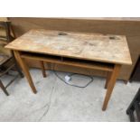 A BEECH CHILDS DOUBLE SCHOOL DESK WITH BRASS SLIDING INKWELLS