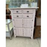 A ;LIME WASHED CABINET WITH FOUR DOORS AND FOUR DRAWERS
