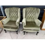 TWO WING AND BUTTON BACK ARMCHAIRS
