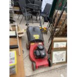 A CHAMPION XC35 PETROL ROTARY LAWNMOWER WITH BRIGGS AND STRATTON ENGINE