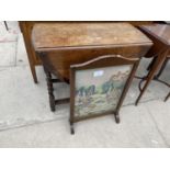 AN EARLY 20TH CENTURY OVAL OAK GATELEG TABLE ON BARLEYTWIST LEGS TOGETHER WITH A TAPESTRY FIRE