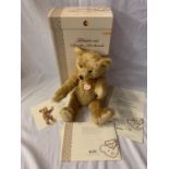A STEIFF TEDDY BEAR WITH A PRESS AND LISTEN MUSIC BOX WITH BOX AND CERTIFICATE