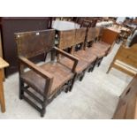 A SET OF SIX CARVED OAK DINING CHAIRS WITH STUDDED LEATHER SEATS AND BACKS (INCLUDING ONE CARVER)