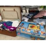 A LARGE QUANTITY OF VARIOUS CLOTHING ITEMS, SOME NEW AND TAGGED, SUITCASE INCLUDED AND FURTHER VTECH