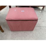 AN UPHOLSTERED FOOTSTOOL WITH LIFT-UP LID