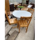 A WHITE DINING TABLE ON METAL BASE, 39" DIAMETER, AND THREE