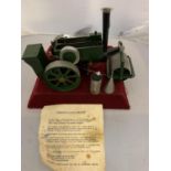 A VINTAGE SELFRIDGES LTD MODEL STEAM ROLLER WITH MINI FUNNEL, JUG AND INSTRUCTION SHEET - MODEL IS